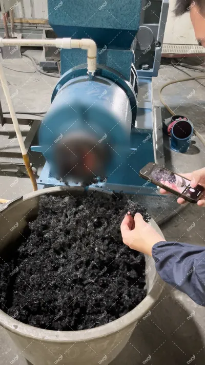 Carbon Fiber Prepreg — Acceptance Trial project case image, Full-process acceptance trial case study: customer carbon fiber prepreg waste tested on the ZFS-250. Demonstrates the on-site performance of liquid cooling temperature control and anti-tangle structure on prepreg material.